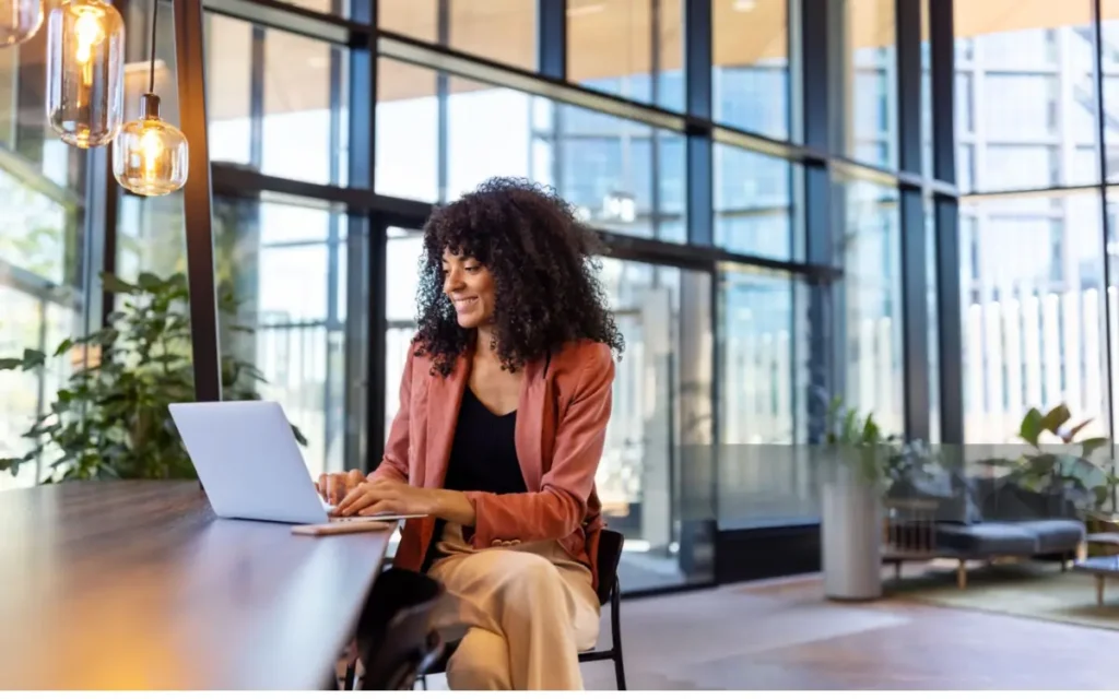 Woman learning online as part of her personal development journey