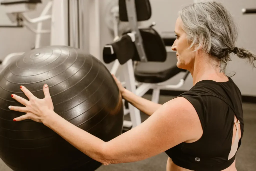 Woman doing strength training during menopause to support type 2 diabetes and menopause weight gain management
